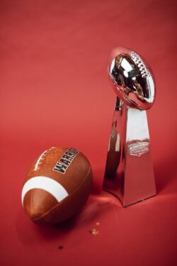 vince lombardi trophy and football.